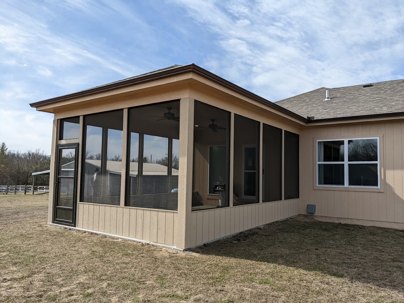 Screened sunroom and covered patio addition by High Valley Decks