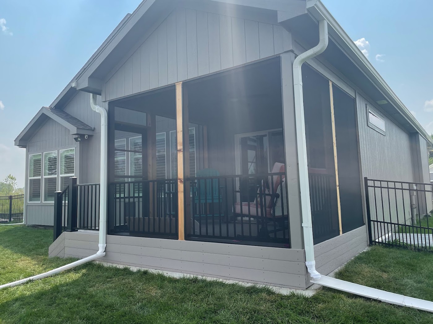 Screened-in porch with a gable roof built by High Valley Decks